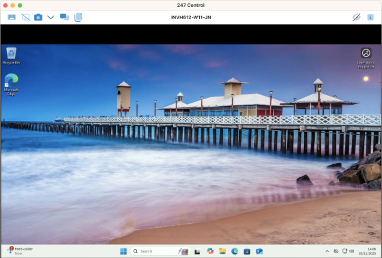 247connect window showing an Agent’s desktop. The remote screen displays a Windows desktop with a pier and beach wallpaper, Recycle Bin and Microsoft Edge icons, and the Windows taskbar at the bottom. The 247connect toolbar is visible at the top with options for viewing and interacting with the Agent’s screen.